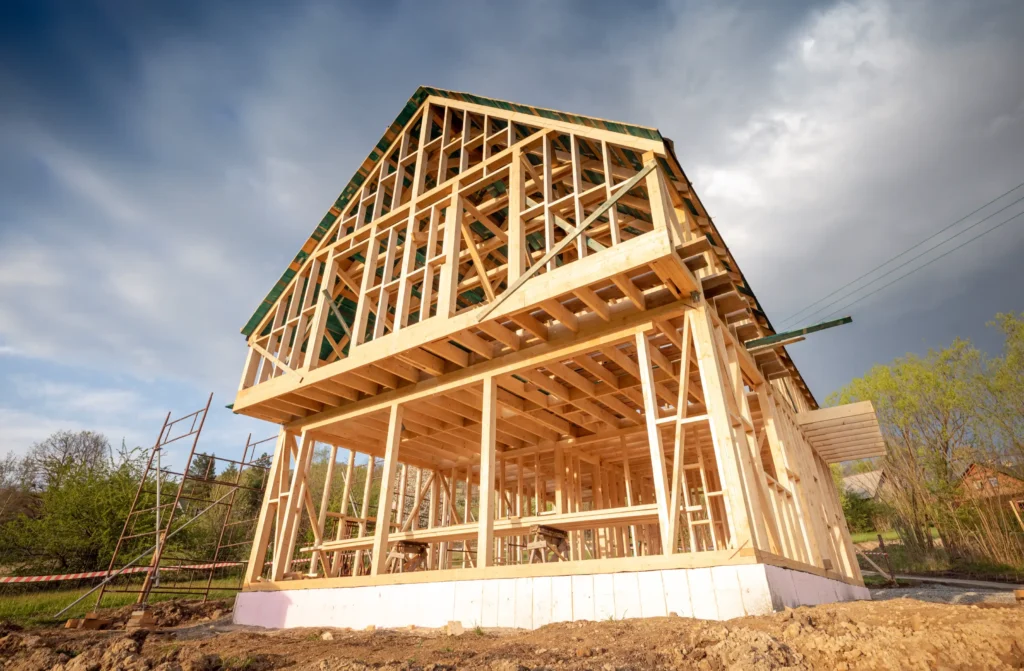 Framing work in progress during residential construction project.